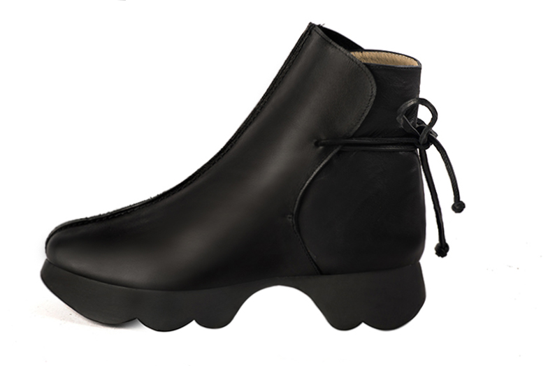 Satin black women's ankle boots with laces at the back. Round toe. Low rubber soles. Profile view - Florence KOOIJMAN